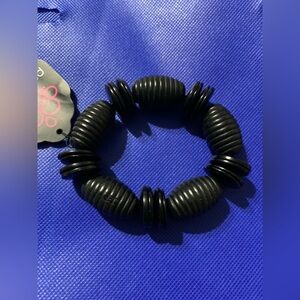 BLACK WOOD BRACELET. Stretch. New. Beautiful!! Has wooden spacers.